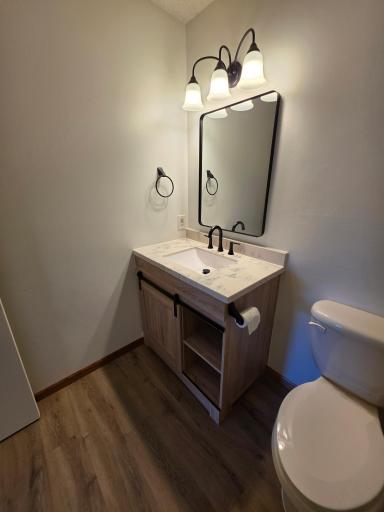 Bathroom Has A New Vanity, Mirror & Lighting
