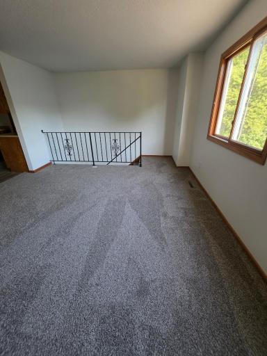 Living Room Has Lots Of Natural Sunlight... New Carpet
