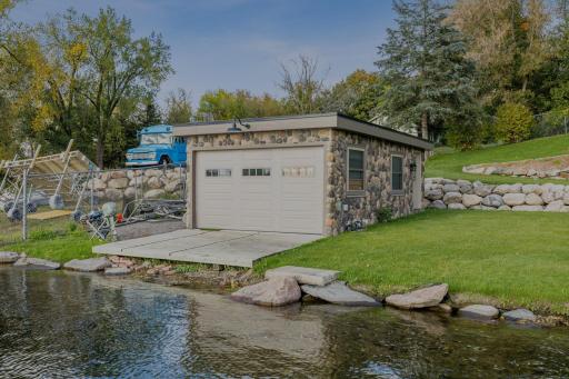 This 25x15 boathouse sits right at the waterâs edge, an increasingly rare find. Offering endless possibilities for lakeside entertaining, storage, or hobby space.