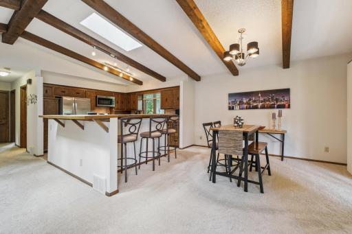 Dining room with breakfast counter ideal for entertaining