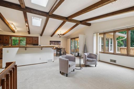 Open design with vaulted and beamed ceilings