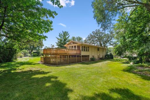 Back view of home showing multiple decking