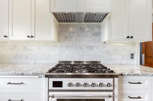 Installed in 2022, the stunning Italian Ilve rangeâwith its integrated warming drawerâstands as a centerpiece of culinary craftsmanship. Framed by a sleek marble backsplash, it brings both sophisticated style and professional-grade function.