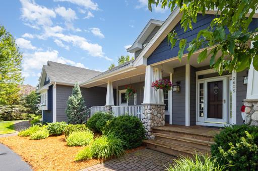 Lovingly maintained and thoughtfully updated, this custom-built home radiates warmth and character. Step onto the expansive 12x38 front porch, where afternoon coffees and neighborly chats are a way of life.