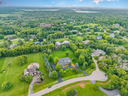 Aerial of this amazing 2-acre home. Orono schools campus is only 1.3 miles north, Lake Minnetonka is only 2.6 miles south, Downtown Wayzata is only 5 miles east, and the Luce line trail is only .5 miles away.