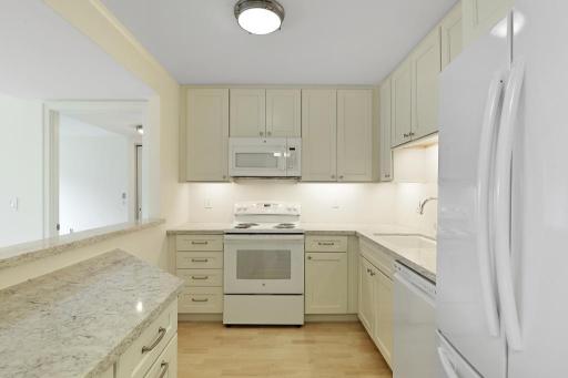 Updated kitchen with new appliances and quartz counter-tops