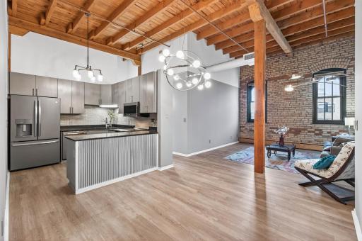 Fresh paint, open concept, exposed brick make this the perfect place to call home!