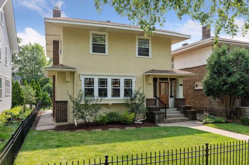 Traditional two-story home in East Bde Maka Ska