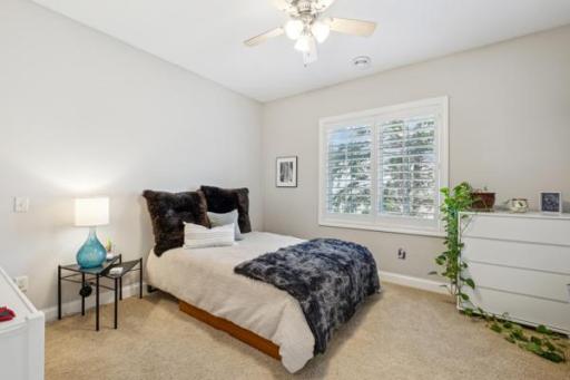 Here's one of the Upper Level Bedrooms. There's a total of 4 Bedrooms on the Upper Level, so there's plenty of space for everyone.