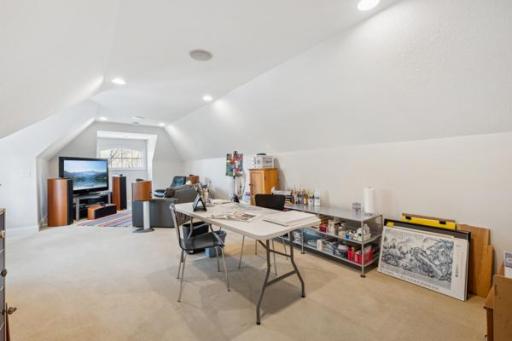 Upper Level Bonus Room is perfect for a studio, a playroom, a study area, or gaming area.