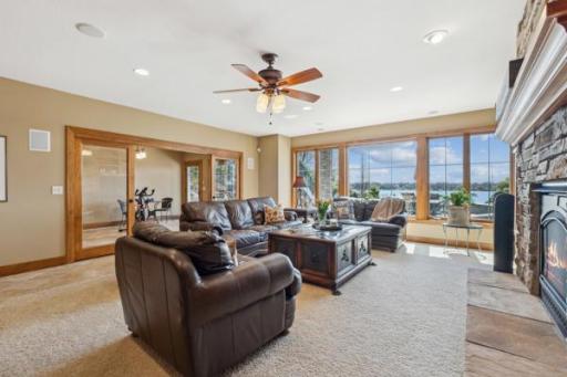 Another spectacular lake view from the Lower Level Family Room. This is another room that has a wall of windows to bring the lake to you.