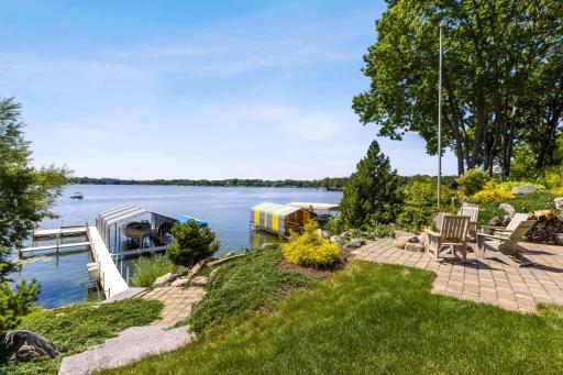 Lower Patio near Lake is perfect for entertaining your lakeside friends. It's even great in the winter for a skating warm up area.
