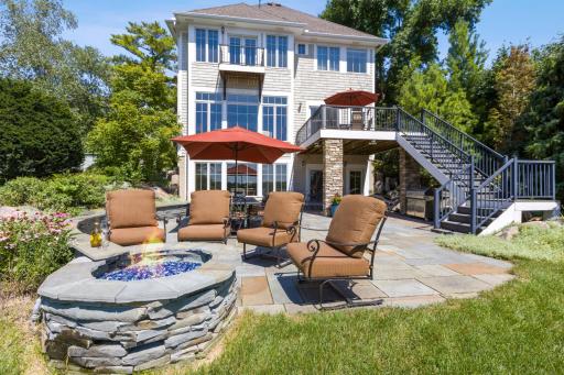 The beautiful patio even has a gas firepit for entertaining on an autumn day.