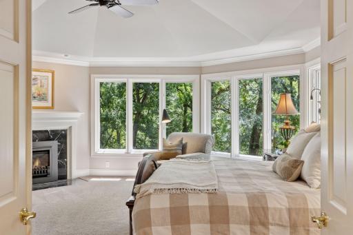 Primary Bedroom - Large Floor to Ceiling Windows overlooking Cullen Nature Preserve