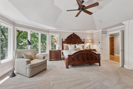 Primary Bedroom - Large Floor to Ceiling Windows overlooking Cullen Nature Preserve