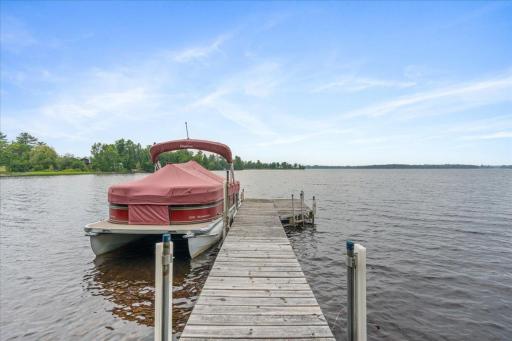 Settle into your boat or canoe as the sun is just beginning to peek above the towering pines.