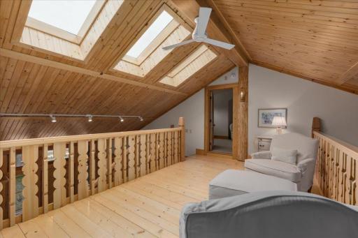 Views from the loft allow you to interact with the living room entertaining and the views of the lake are amazing. Watch the water dance.