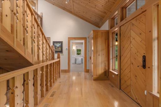 A grand foyer perfect for greeting guests and there is a large guest closet in the hall