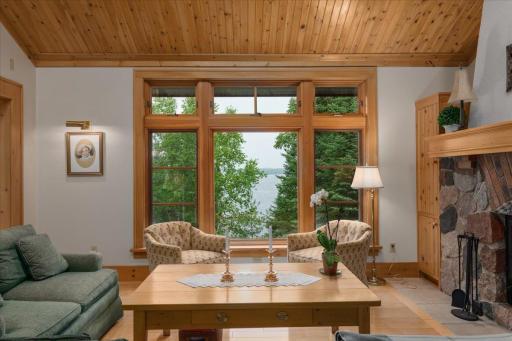 And of course the first thing you will see when you walk through the entry is the floor to ceiling picture window overlooking the lake. Quintessential Lake Experience.