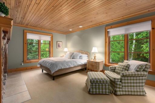 The primary suite is on the other side of the living room overlooking the lake.