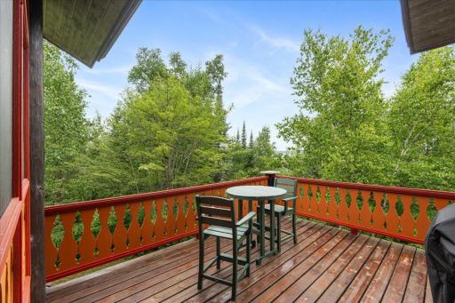 Views from the deck offer a stunning tree top view overlooking the lake and the sounds of the loons can be heard off in the distance.