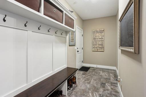 Spacious mudroom and main-floor powder bath for everyday convenience