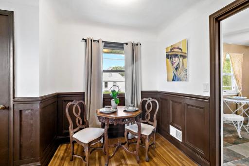 This charming dining or game area is a fabulous spot to play your favorite game of cards or enjoy an evening dinner