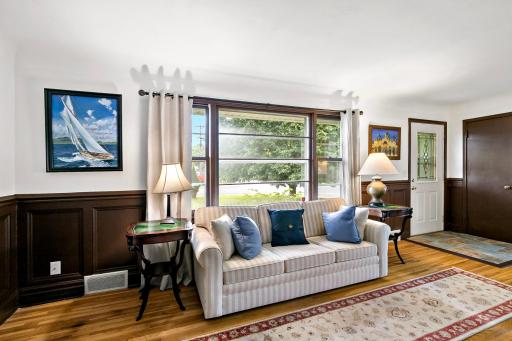 Natural light from the west facing windows floods the bright and spacious living room