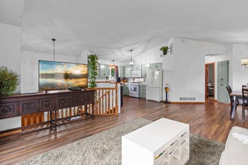The upper level has a great flow with its open concept and newer LVP flooring (2020) throughout the main area! The matching matte black light fixtures were also updated in 2020.