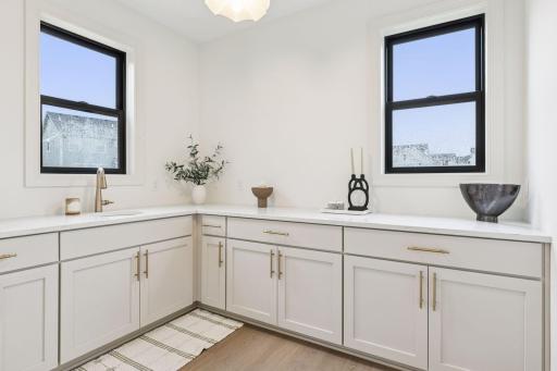 Need more kitchen or storage! Your prep nook is located right off the kitchen, connecting to your walk-in pantry!