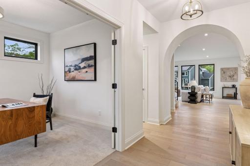 Your foyer will greet you with a flex room that showcases glass french doors