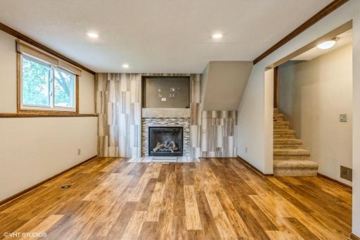 Gas fireplace with surround. Space for wall mounted t.v.
