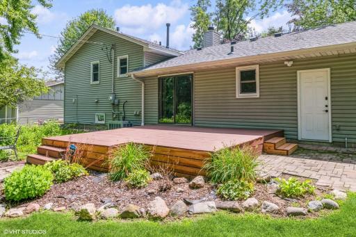 Big deck for relaxing in your park-like back yard.