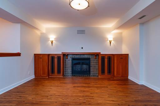 The cozy gas fireplace in the lower level family rooms keeps this space cozy.
