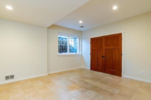 One of two large bedrooms in the lower level.