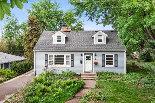 "Charming curb appeal with mature trees and a welcoming exterior in a mature West St. Paul neighborhood