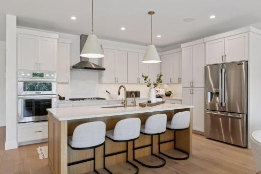 Photos are of the model home located at 5655 Buffington Lane. Design selections and upgrade options may vary.
