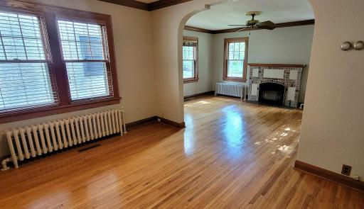 There are oak hardwood floors throughout the main level. also note the oak crown moldings in the living and dining rooms.