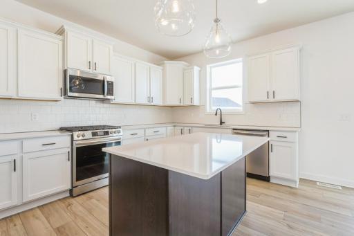 (Photo of a similar home, finishes may vary)