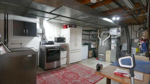 Utility room...the refrigerator stays......