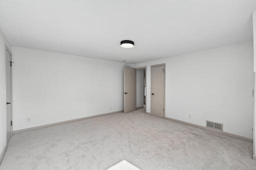 The depth of the 2nd bedroom is substantial! All rooms are freshly painted, including all trim, brand new carpet and new hardware.