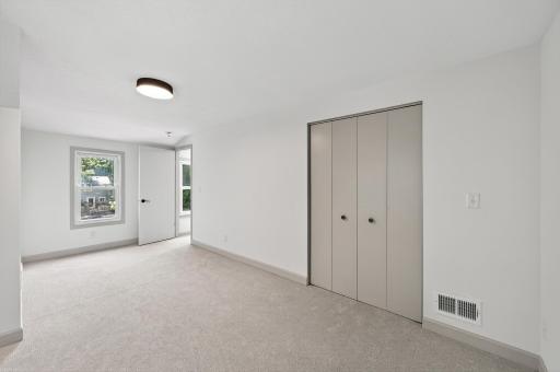 Oversized rooms, plush new carpet, and custom touches like built in shelving and bonus closets make the upper level feel like a peaceful private retreat.