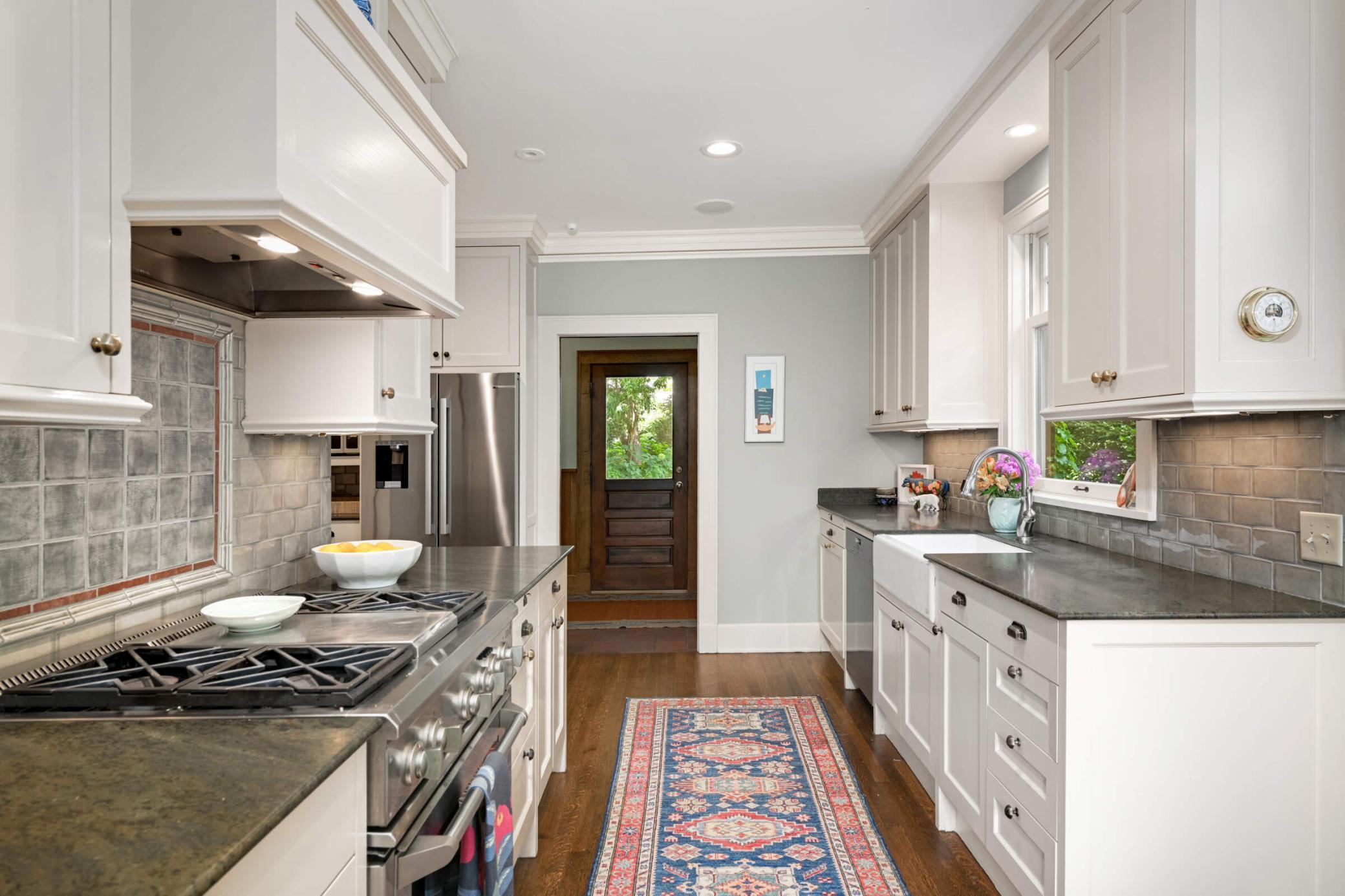 Custom mudroom with built-in lockers just off the kitchen.