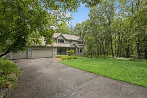 This serene woodland retreat is ready to welcome you home. Floor plan available in supplements.