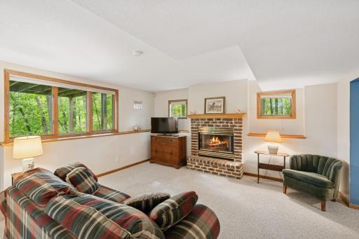 Cozy up to the fire. This is one of two wood burning fireplaces the home has to offer.