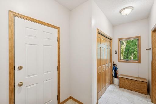 The rear tile Mudroom entry has access direct to the garage. Loads of closet space too.