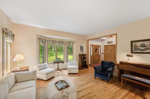 This home offers numerous rooms designed to accommodate both formal and casual living, with a floor plan that flows seamlessly from space to space.