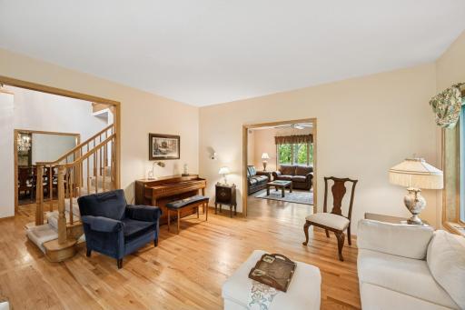 To provide more privacy, there is a solid Oak sliding pocket door separating the living area from the family room.