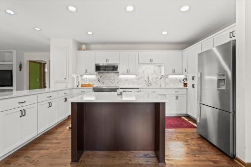 Bright Kitchen with Stainless Steel Appliances & Island