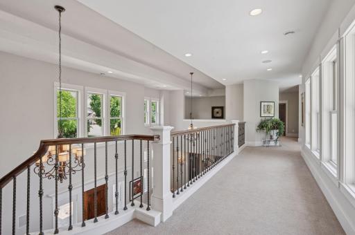 Walkway leading to the 3rd bedroom, bathroom, and loft.